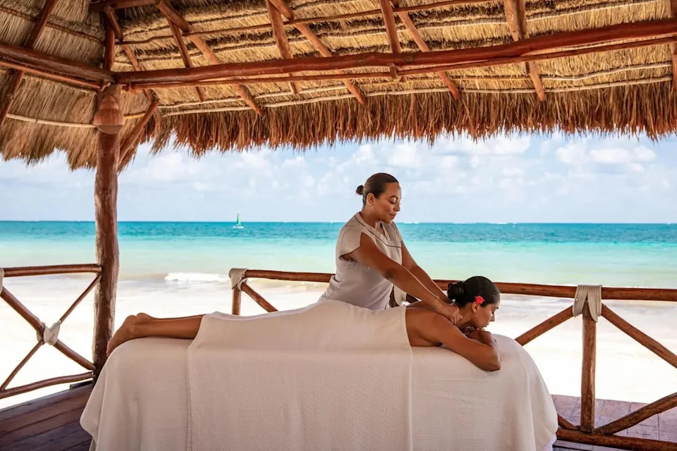 Outdoor beachside massage at Miilé Spa Excellence Riviera Cancun Riviera Maya