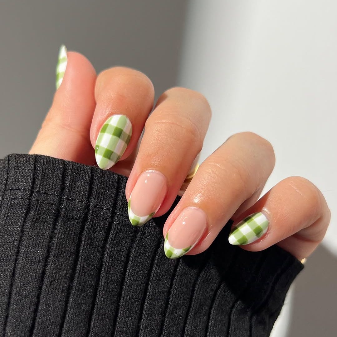 manicure featuring green checkered nail art