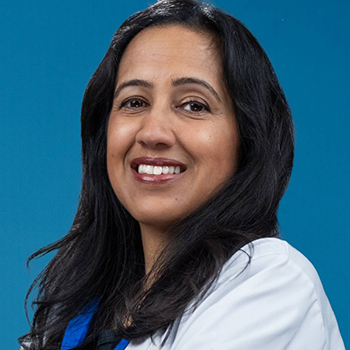 Headshot of Rajita Patel in her lab coat