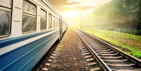 train on tracks by woods at sunset; Supreme Court Issues Unanimous Decision in Galette v NJ Transit