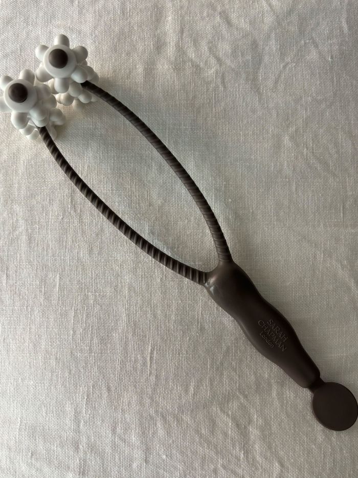 The Sarah Chapman Skinesis The Facialift on a white linen background