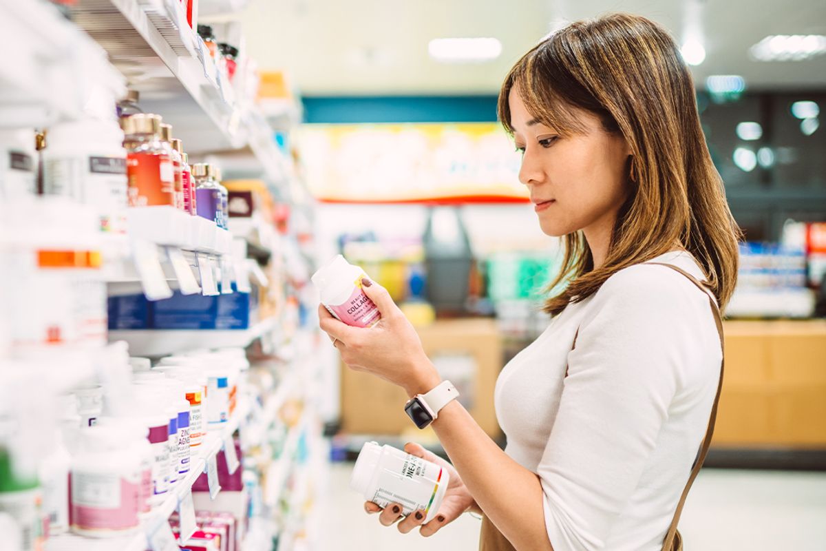 A woman buying supplements