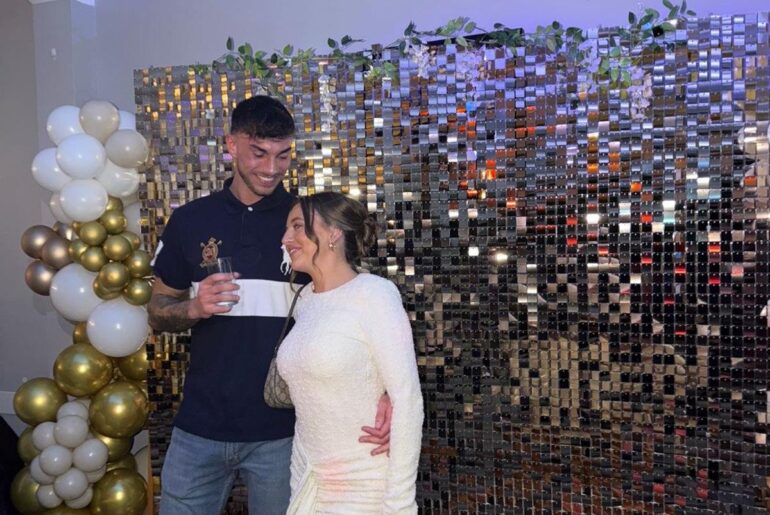 Olivia and her fiancé, Jamie, at their engagement party