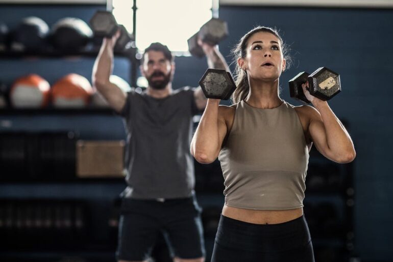 Should runners lift heavier weight, lower reps or lighter weight, higher reps? A strength coach explains all