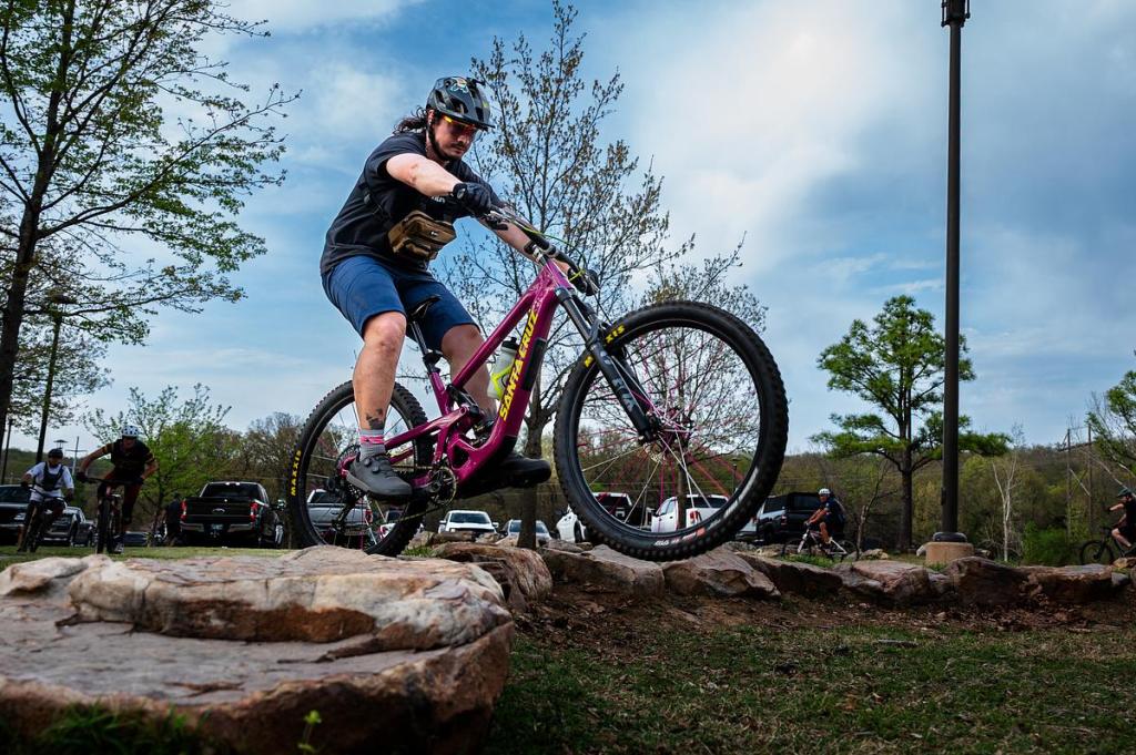 Chase Blair practices a new skill during the Project Dudeman skills clinic at Turkey Mountain on Tuesday, March 31, 2026. The clinic was led by Brad Huff and focused on fundamental skills before a group ride. 
