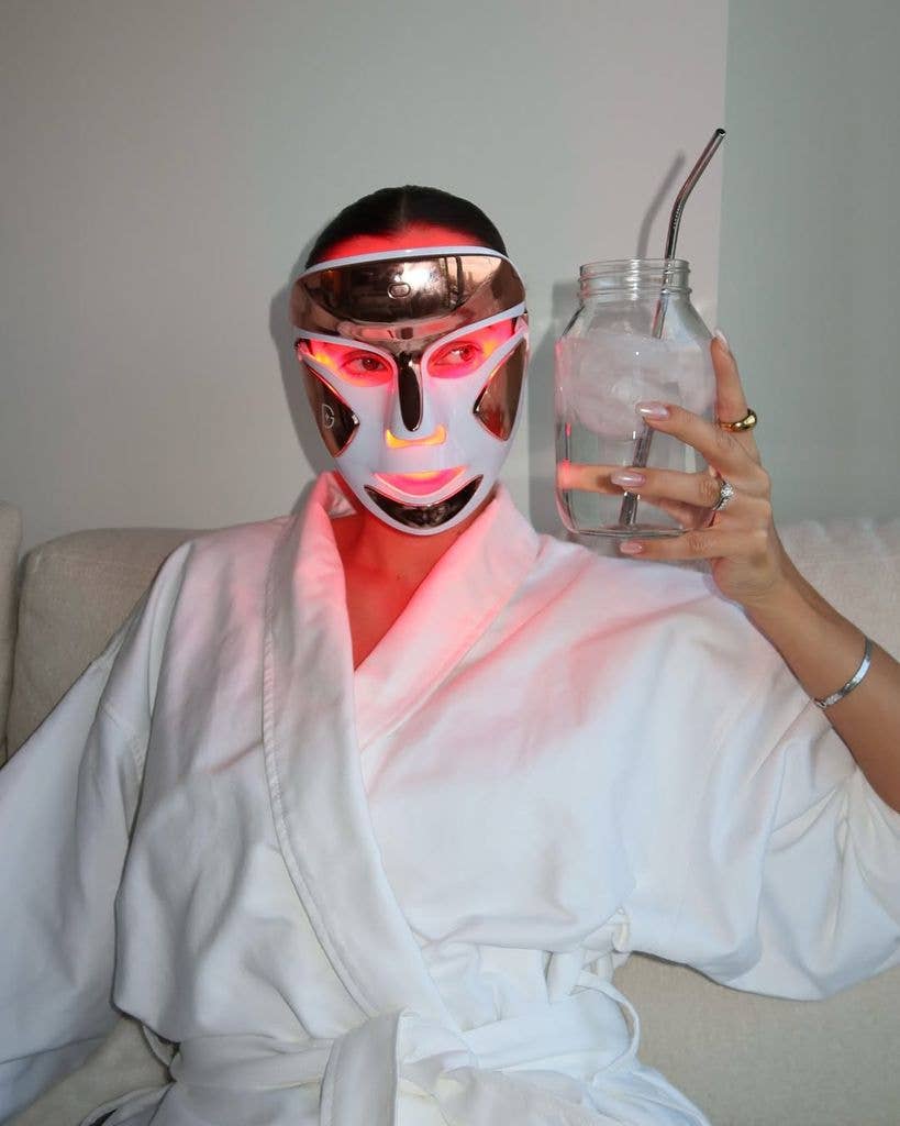 Olivia Pura in LED mask