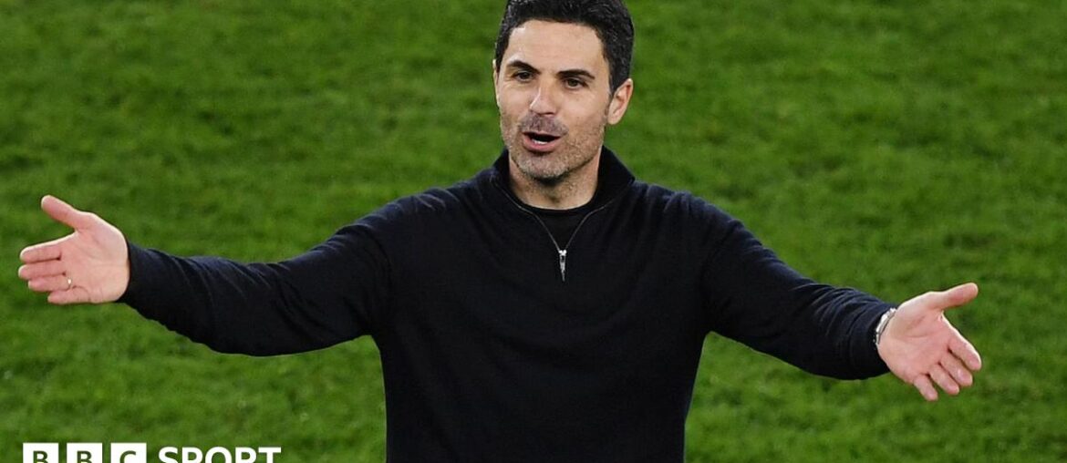 Mikel Arteta with his arms outstretched