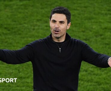 Mikel Arteta with his arms outstretched