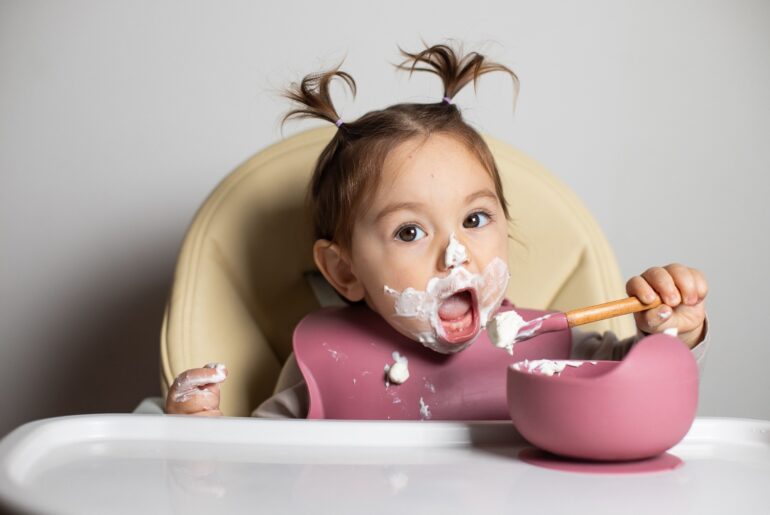 Pediatric experts say plain yogurt is safe from 6 months and belongs in a baby’s diet