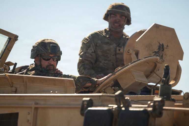 1-12 Cav trade knowledge with NATO partner on M1A2 Abrams