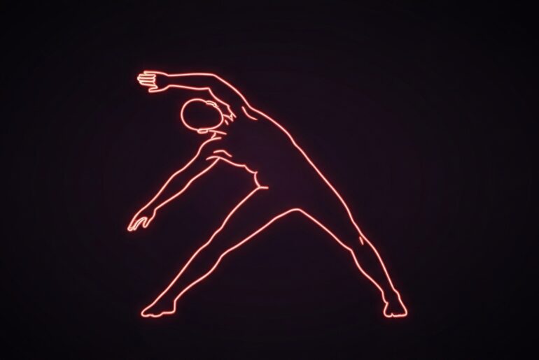 A vibrant, neon outline of a person stretching their arms overhead, the glowing lines defining the shape and movement against a dark, shadowy background, conceptually representing the power of basic, consistent physical activity.
