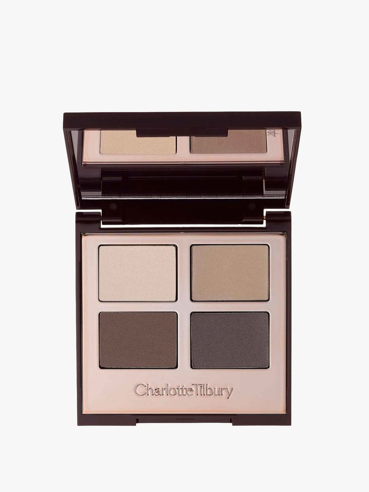 Image may contain: Head, Person, Face, Mailbox, Paint Container, Cosmetics, and Palette