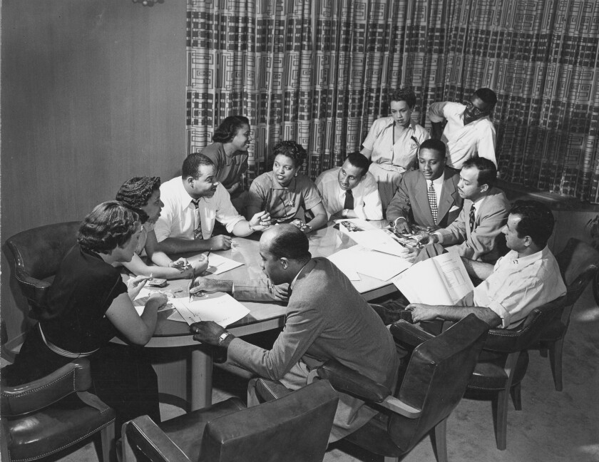 Ebony Magazine Editorial Meeting with Freda DeKnight, Publisher John Johnson, Editor Ben Burns, Leroy Wimbush, taken in their offices in a converted funeral parlor, Chicago, Illinois.