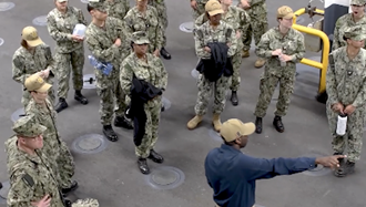 Link to Video: Seaman directing training personnel onboard ship.