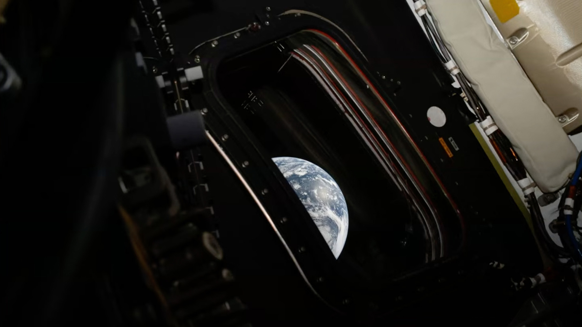 This image provided by NASA shows a downlink image of Earth taken by NASA's Artemis II astronaut commander Reid Wiseman inside the Orion capsule on Friday, April 3, 2026.