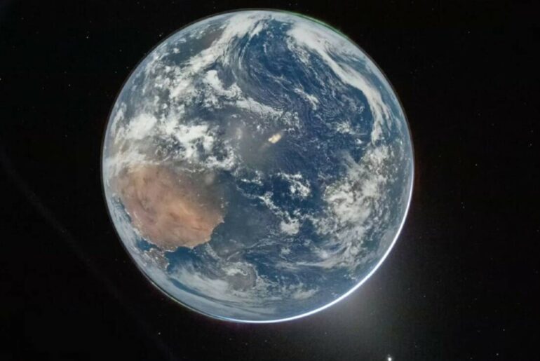 This image shows a view of Earth taken by NASA astronaut and Artemis II Commander Reid Wiseman ...