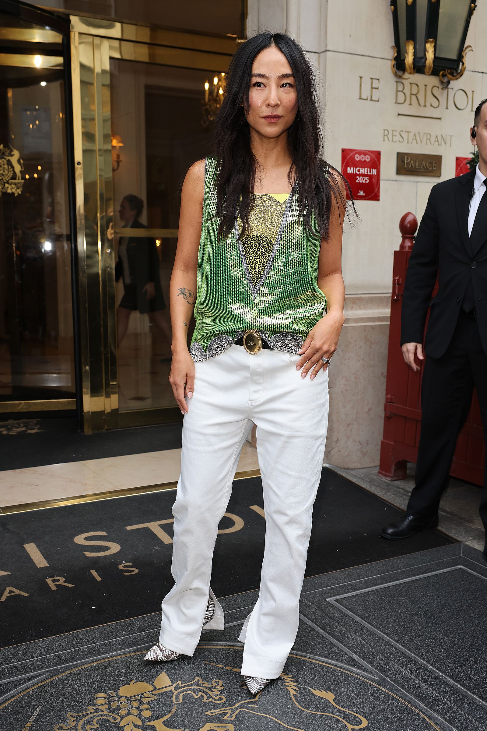 Image may contain Greta Lee Clothing Pants Person Standing Black Hair Hair and Adult