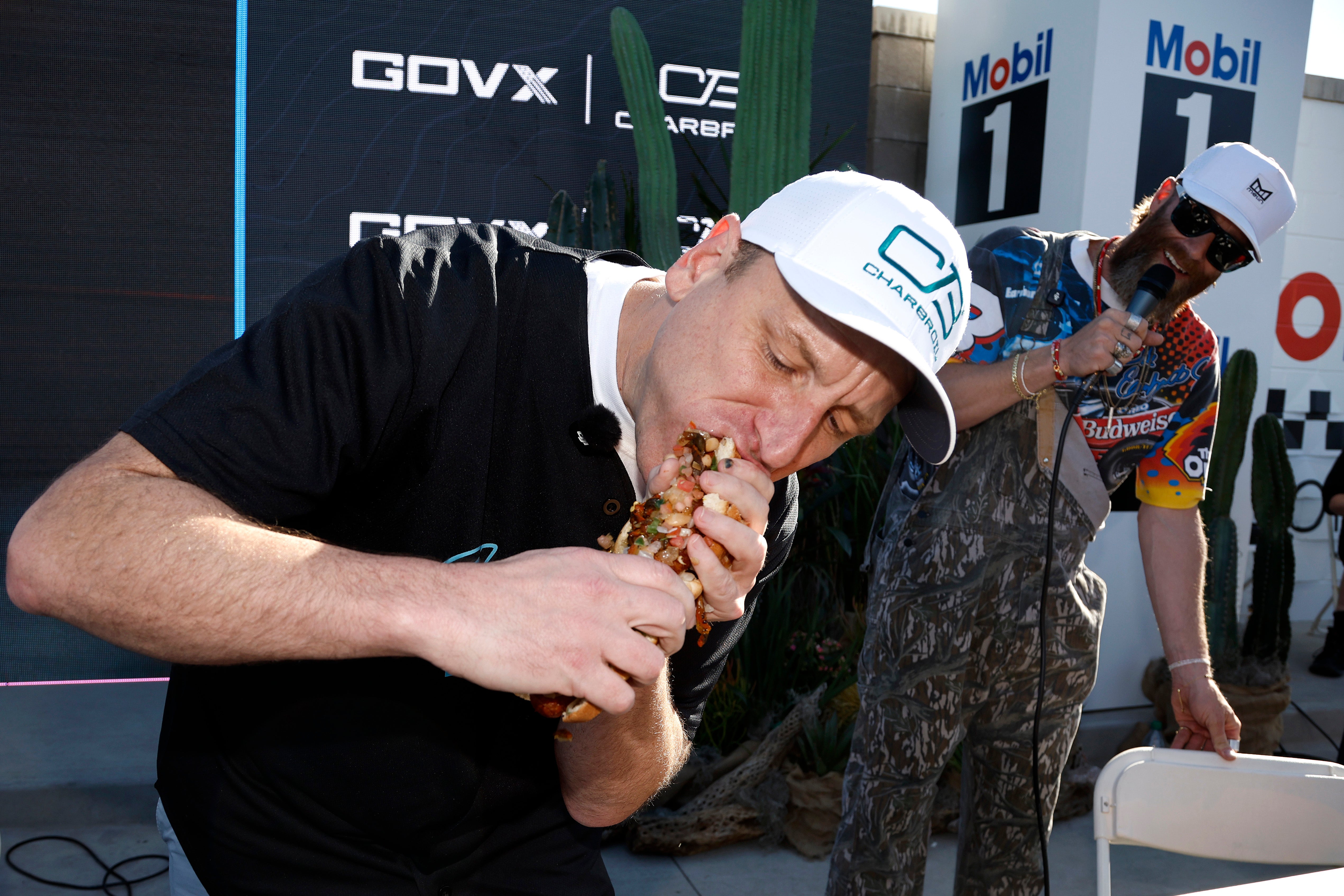 Competitive eater, Joey Chestnut, competes in a hot dog eating contest in March in Avondale, Arizona. Hot dogs and other processed meats have been tied to poor memory