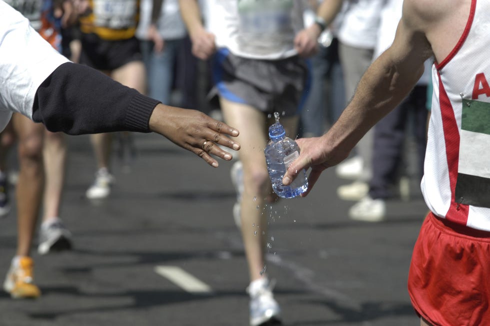 collecting bottled water in the london marathon