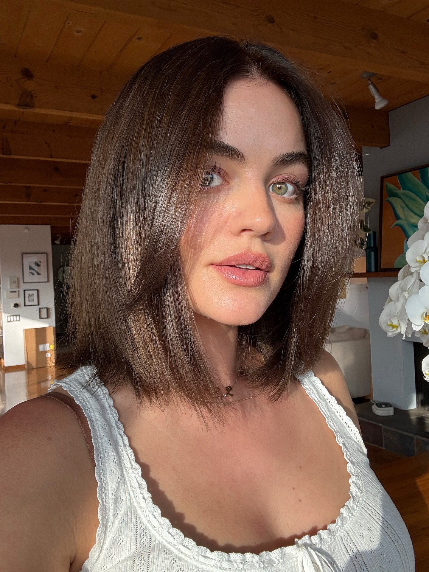 A selfie of Lucy Hale with a blunt bob