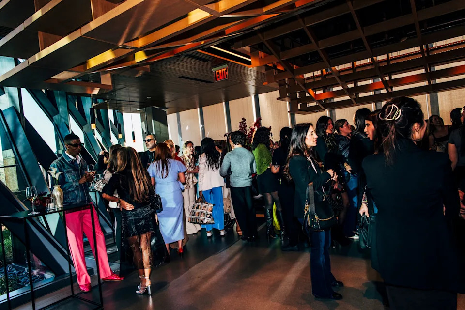 Guests mingling at the Genesis House bar.