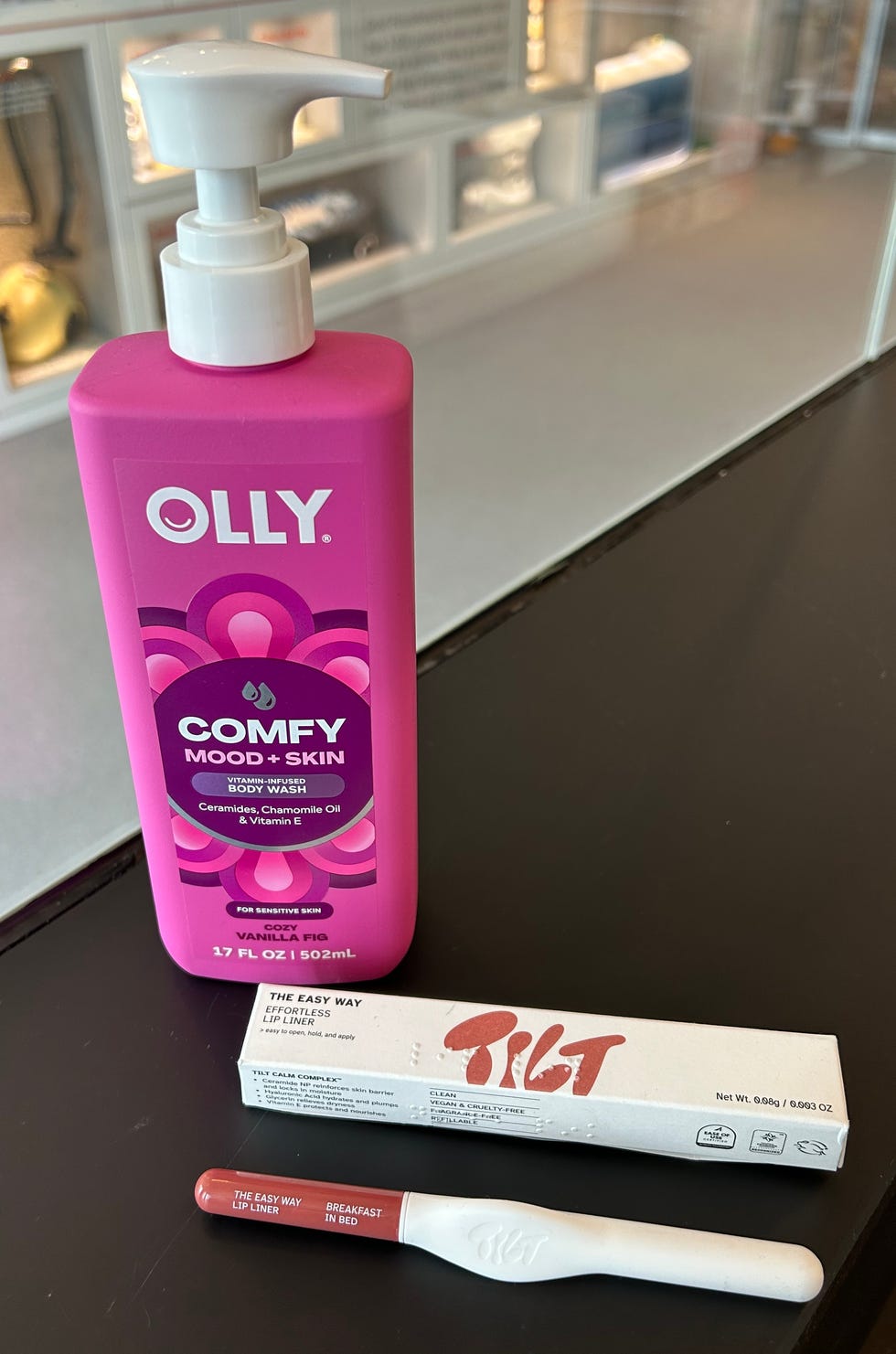 Body wash and lip liner packaging.