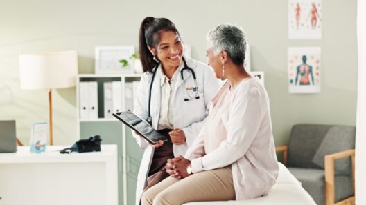 Patient meeting with primary care doctor during annual wellness visit for preventive care