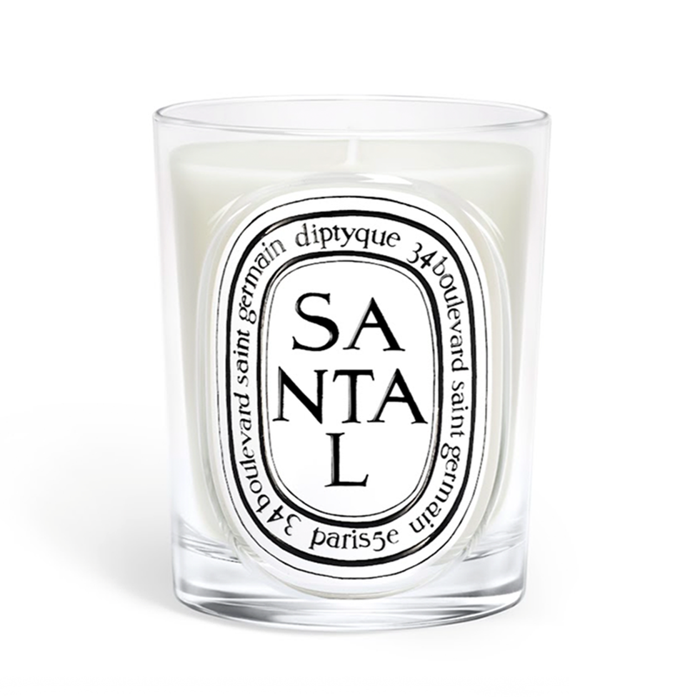 Scented candle in a glass container.