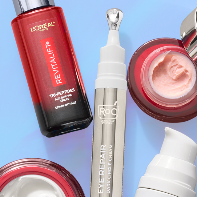 Various skincare products displayed with a light background.