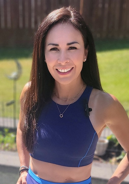 woman facing the camera smiling