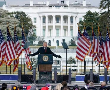 With the White House in the background, President Donald Trump speaks at a rally on Jan. 6, 2021, in Washington.