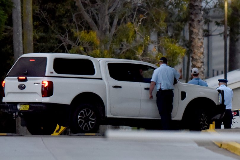 Ben Roberts-Smith is escorted out by correctional officers at Silverwater Correctional Complex on April 17, 2026 in Sydney, Australia.
