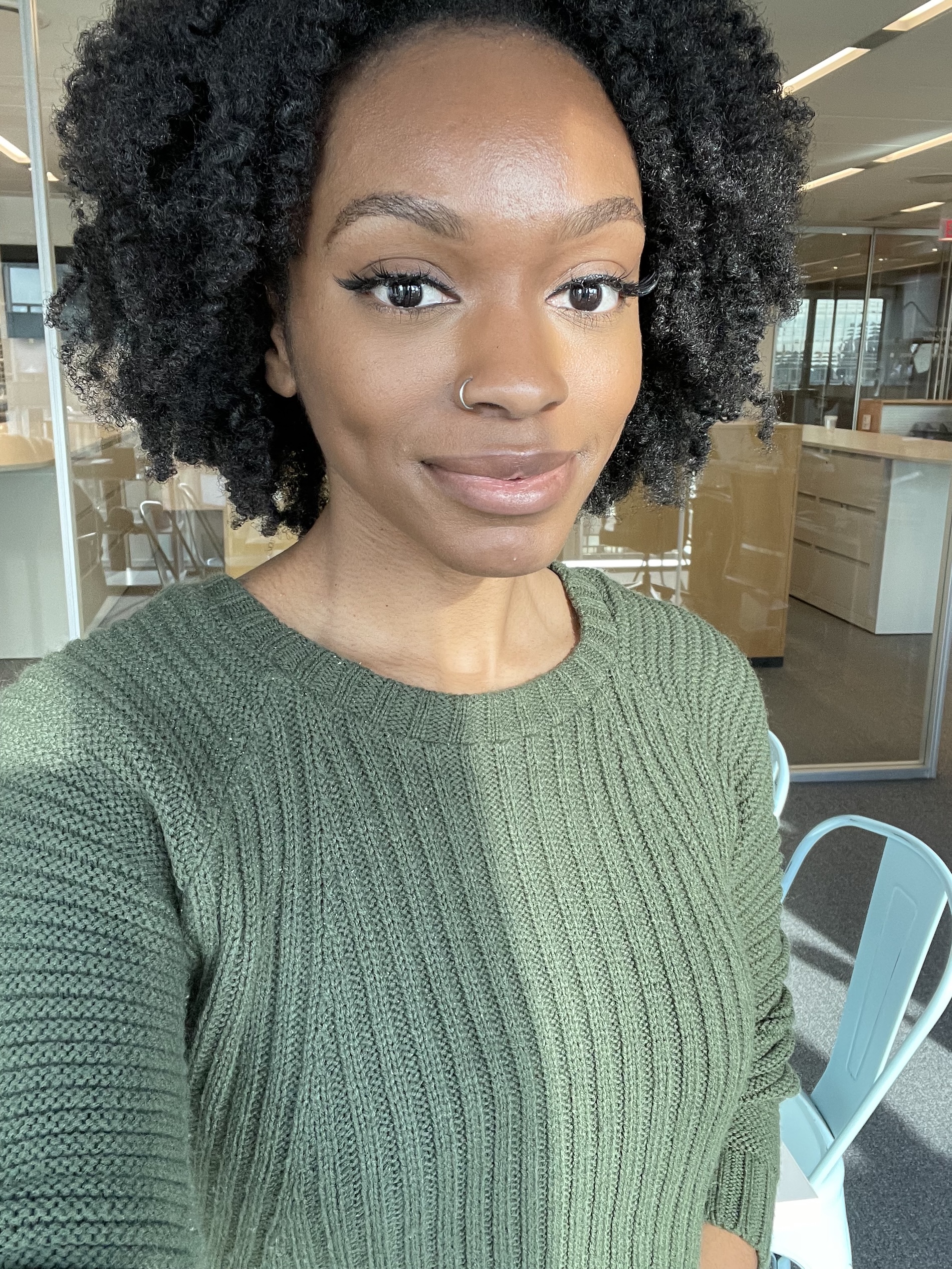 a black woman with dark, coily hair