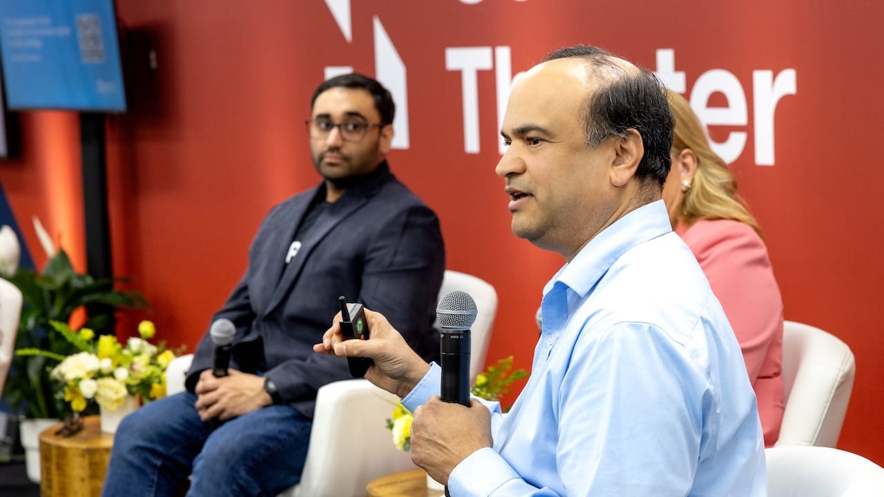 Abhijit Natu on stage at SupplySide Connect