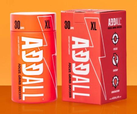 Two packages of ADDALL XL dietary supplement displayed against an orange background. The product features bold white "ADDALL" text on a vibrant red-orange gradient packaging. The left package shows a cylindrical bottle labeled "30 capsules" and "FOCUS ENERGY CAPSULES." The right package shows the rectangular box with "XL" prominently displayed and three circular icons indicating product benefits. Both packages emphasize the "30" count and "XL" designation in the upper portion of the design.