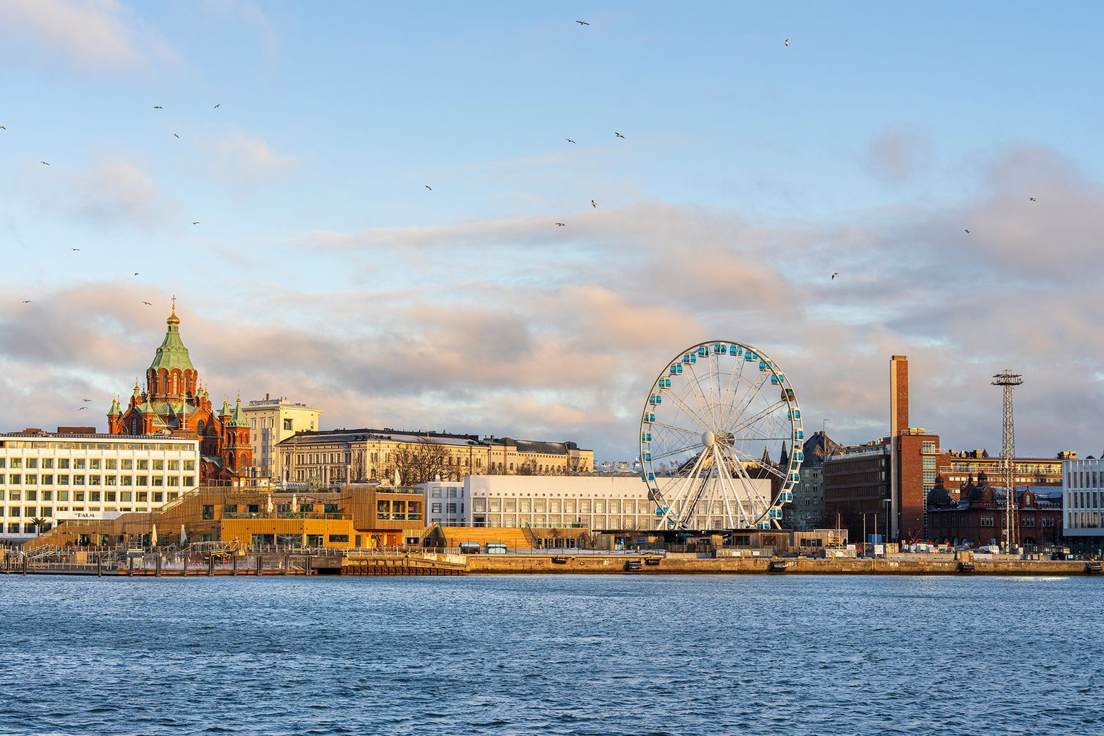 Image may contain Architecture Building Cityscape Urban Machine Wheel Water Waterfront and Amusement Park