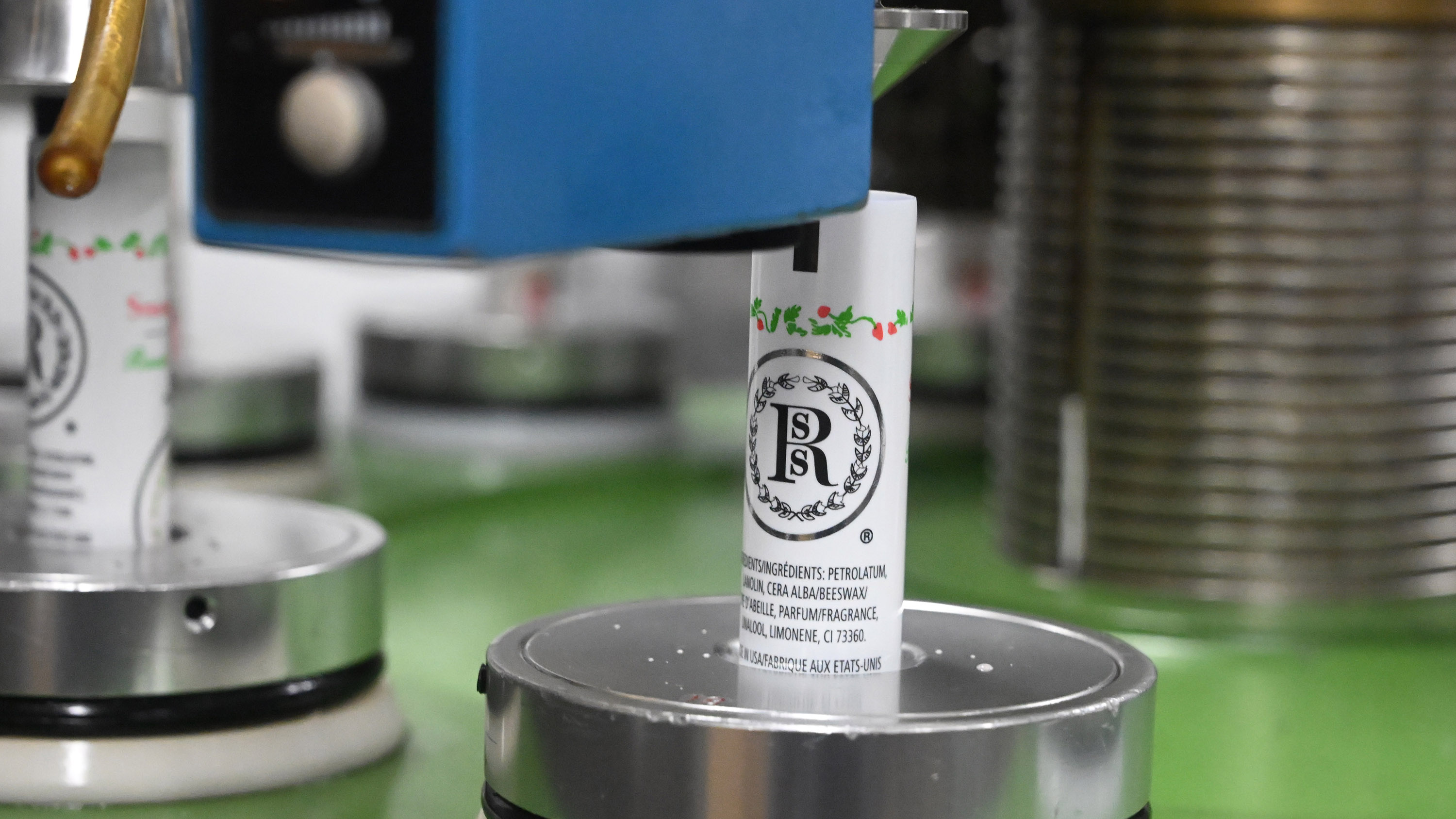 Tubes of Smith's Strawberry Lip Balm are filled at Case...