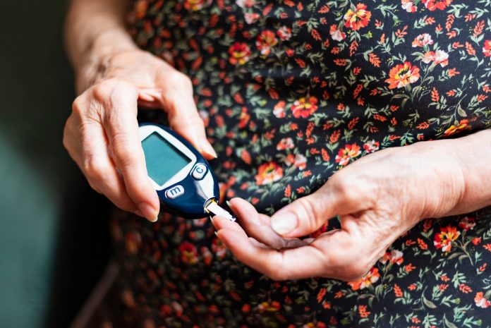 Woman Testing Blood Sugar. Neuritin 1 is a promising new target for treating type 2 diabetes and obesity.