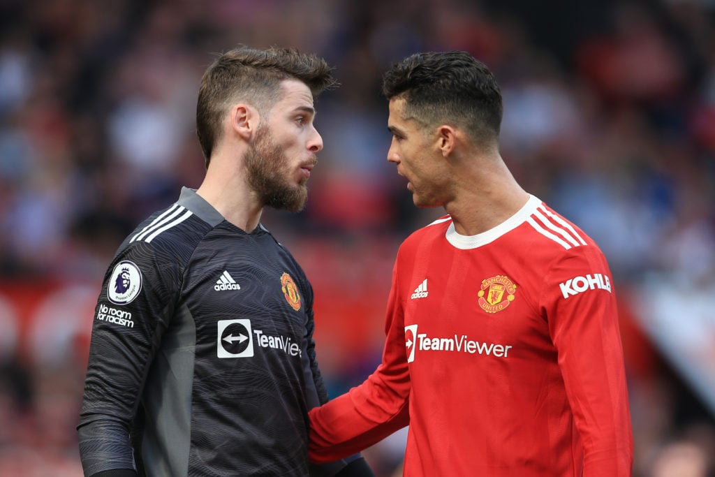 Manchester United legends David de Gea and Cristiano Ronaldo during the Premier League match against Norwich City at Old Trafford on April 16, 2022, in Manchester.