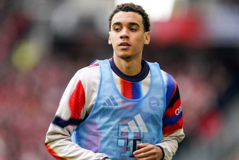 Jamal Musiala remains a long way from full fitness, and a fresh twist at FC Bayern Munich is complicating the club’s handling of the young playmaker. The Germany international, who has been sidelined with a recurring muscle issue, was expected to step up his rehabilitation this week. However, a behind-the-scenes review of his training load has prompted coaches to hit the brakes, concerned that pushing him too soon could risk further setbacks. This cautious approach underlines Bayern’s broader strategy of managing high-value talents, but it also underscores the delicate balance they must strike between preserving Musiala’s long-term development and fielding a competitive side in the here and now. With the title race entering its final straight and the Champions League knockouts looming, every match is crucial, and every decision carries extra weight. For fans eager to see Musiala’s match-winning brilliance, the wait drags on. For now, patience remains the watchword, even as Bayern’s medical team continues to monitor his progress closely