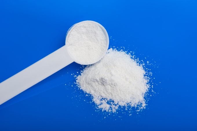 Sport supplement, creatine, hmb, bcaa, amino acid or vitamin mesure with powder. Sport nutrition concept.