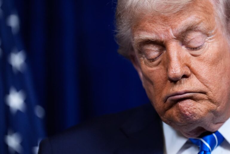 President Trump closed his eyes during a joint news conference with Ukraine's President Volodymyr Zelensky following a meeting at his Mar-a-Lago club in Palm Beach, Fla., on Dec. 28, 2025.