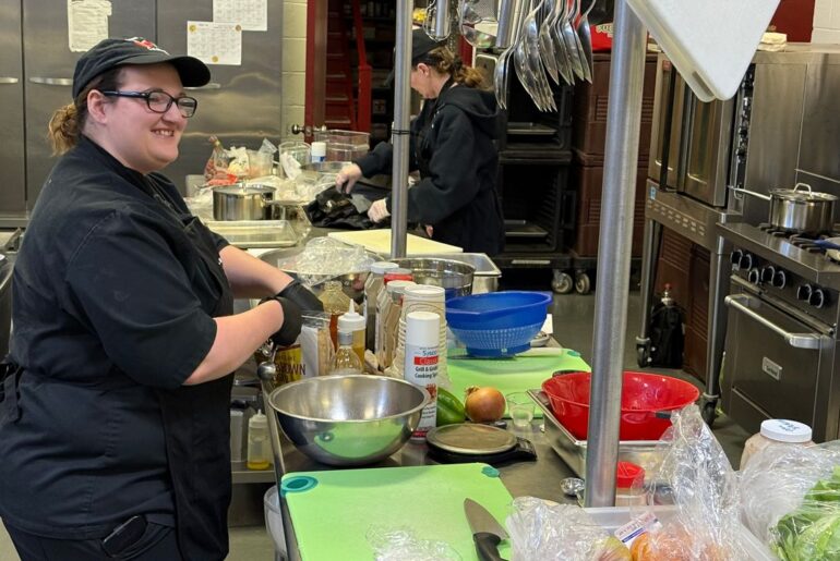 Team Nourish Kids of RSU 22 competitor and Maine DOE 2026 Farm-to-School Cook-Off Champion Hannah Liberty works in the kitchen Wednesday. (Spectrum News/David Ledford)