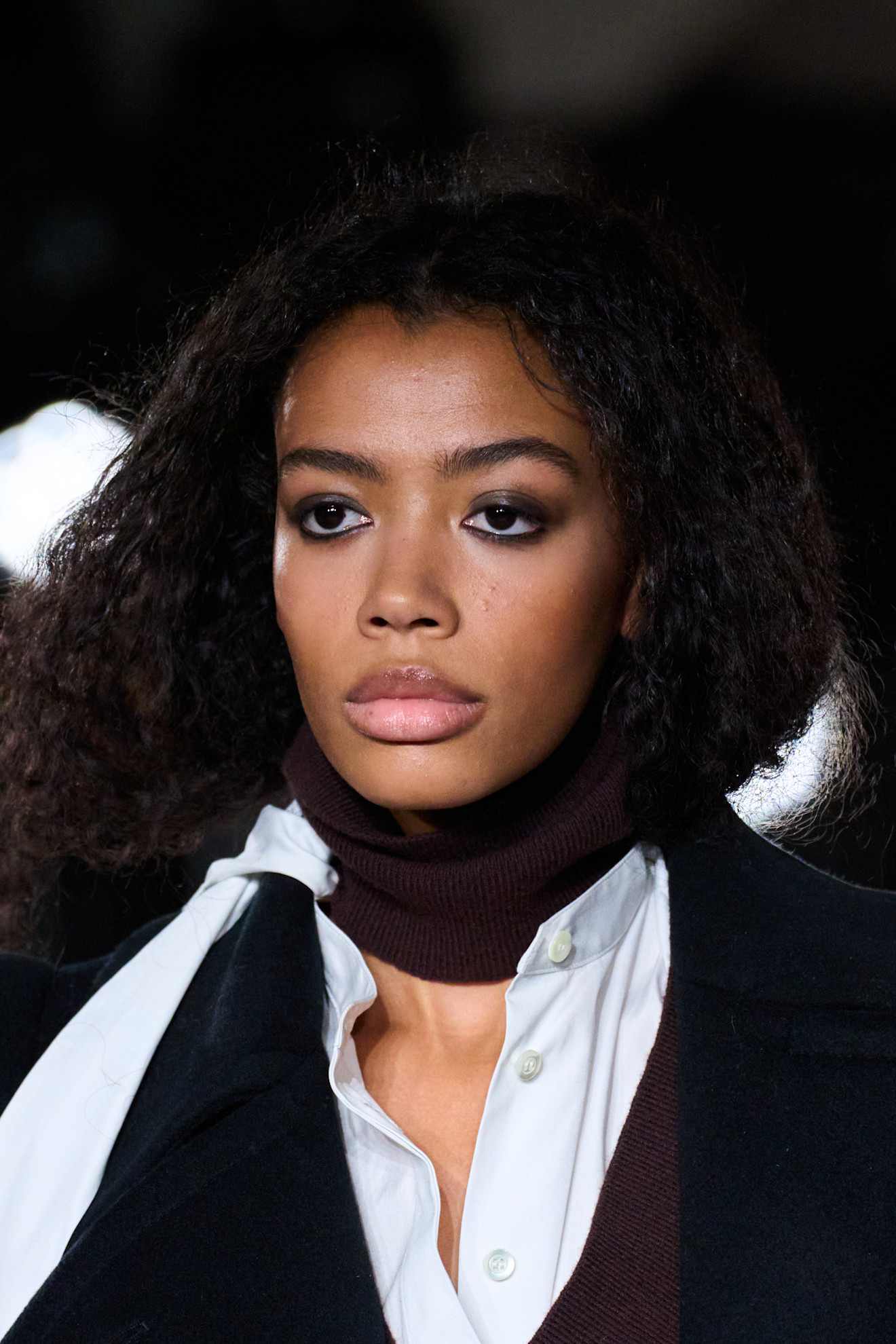 A model with a messy black smoky eye at the 7 For All Mankind Show F/W 26.