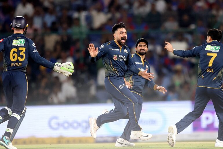 Gujarat Titans' Rashid Khan celebrates the wicket of Delhi Capitals batsman Sameer Rizvi during the IPL match between Delhi Capitals and Gujarat Titans at Arun Jaitley Stadium in New Delhi on Wednesday. (EXPRESS PHOTO BY PRAVEEN KHANNA)
