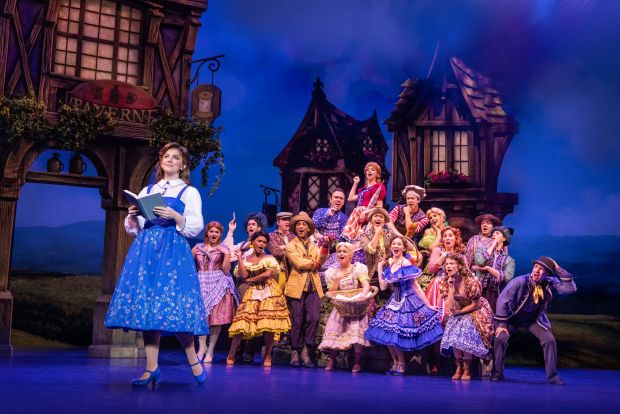 Voracious reader Belle (Kyra Belle Johnson) and the townsfolk ensemble of "Disney's Beauty and the Beast." The show's national tour is at The Bushnell April 7-12. (Matthew Murphy)