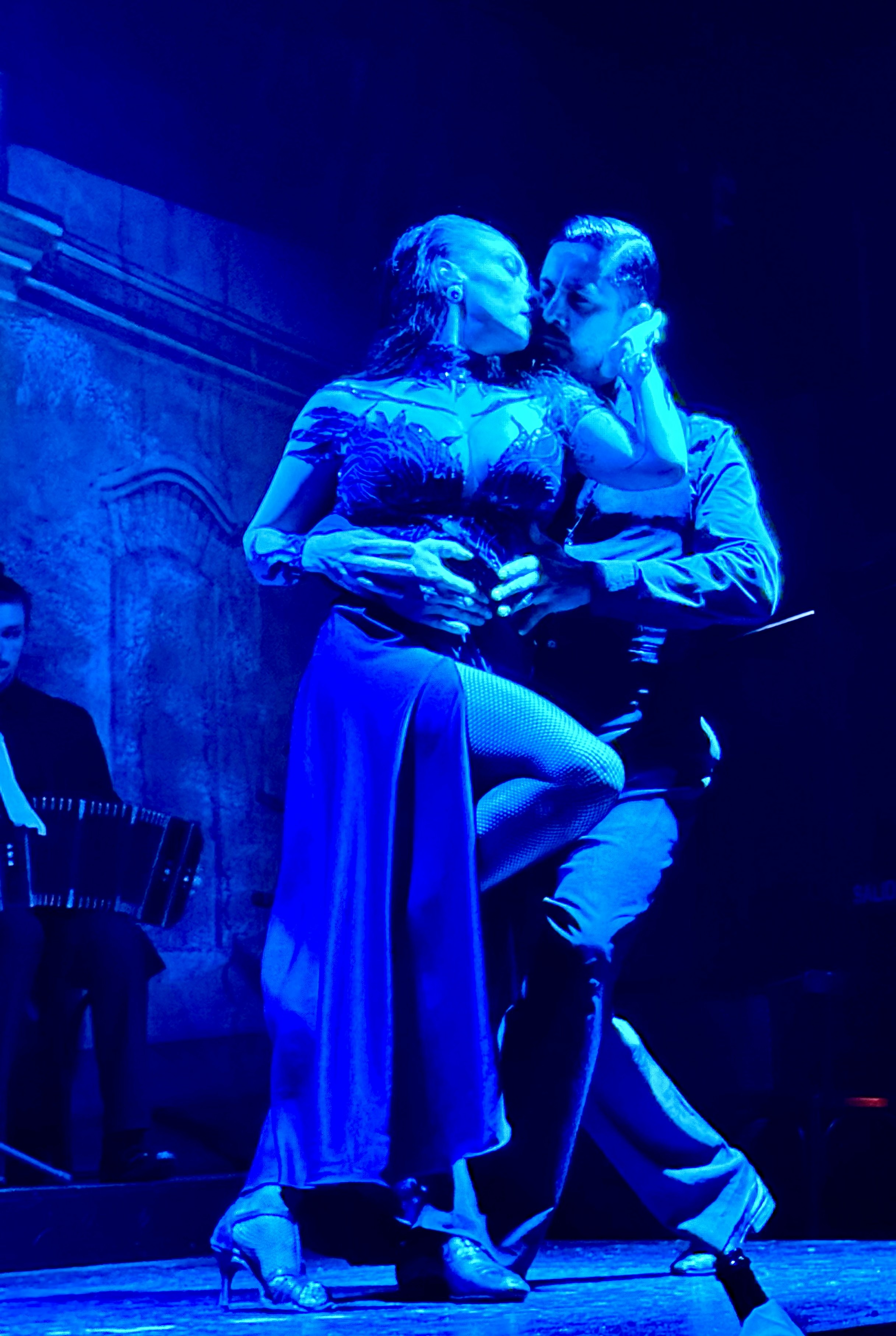 Tango dancers in statuesque embrace. Virginia Mason