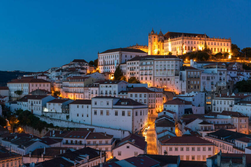 Travel and tour world - travel and tour world Beautiful lisbon cityscape at dusk, portugal's wellness tourism hub.