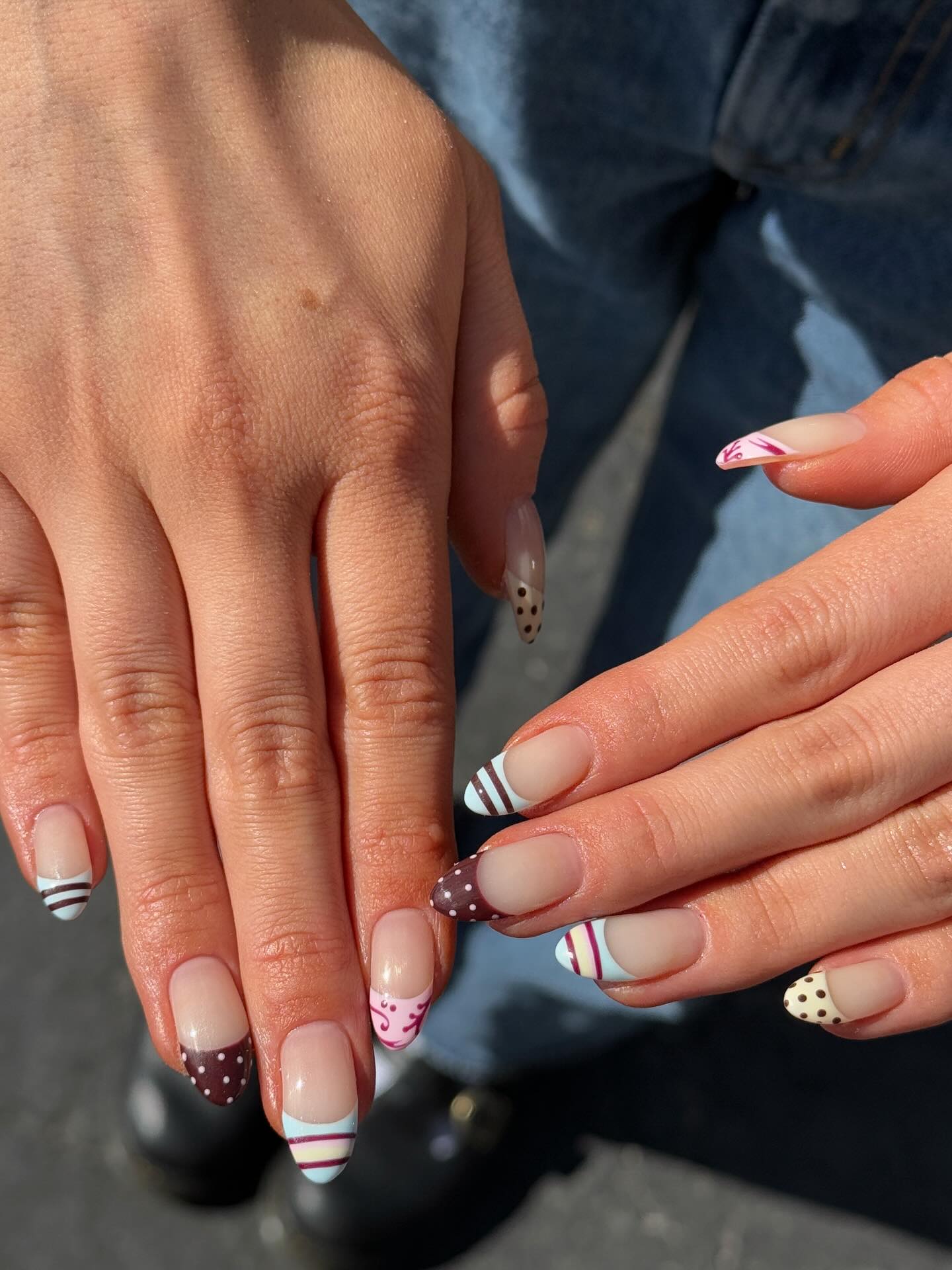 Mismatched nails.