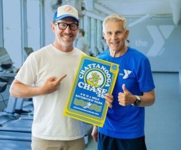 Alan Outlaw (left) and Baron Herdelin-Doherty showcase the 2026 Chattanooga Chase commemorative poster